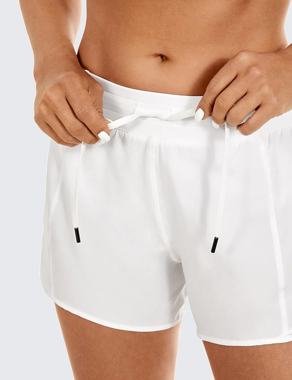 CRZ YOGA Womens Athletic Running Shorts with Zip Pocket, 4" Mid-Waist Mesh Liner Gym Workout Shorts
