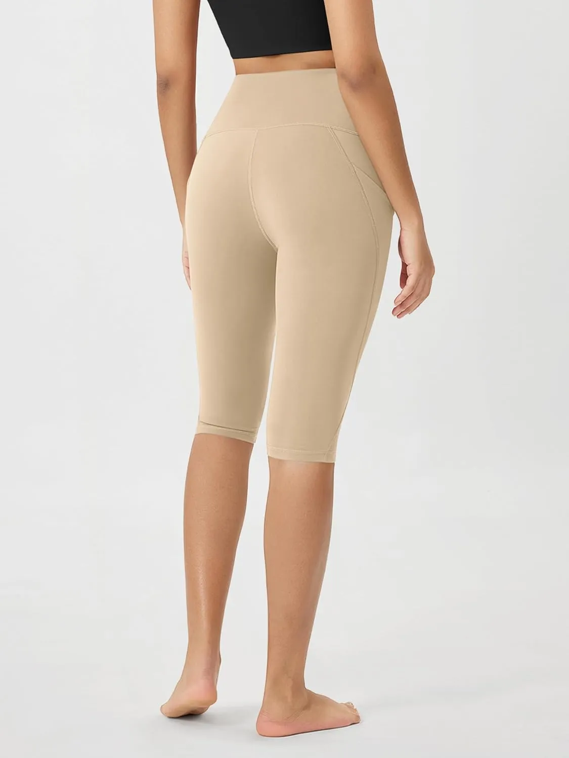 ODODOS Women's High Waisted Yoga Capris with Pockets, Tummy Control Non See Through Workout Athletic Running Capri Leggings